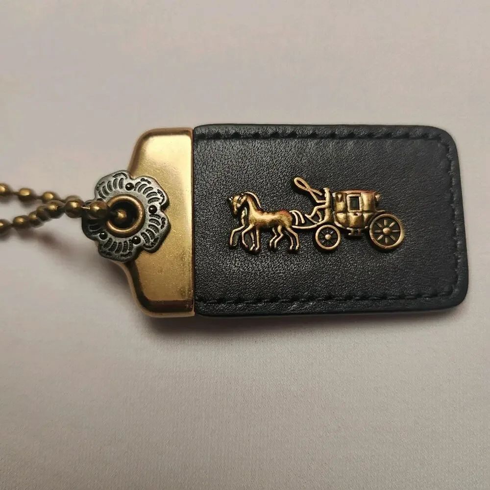 Coachโ1941 Horse Carriage Hang Tag Bag Charm - Brass Midnight Navy